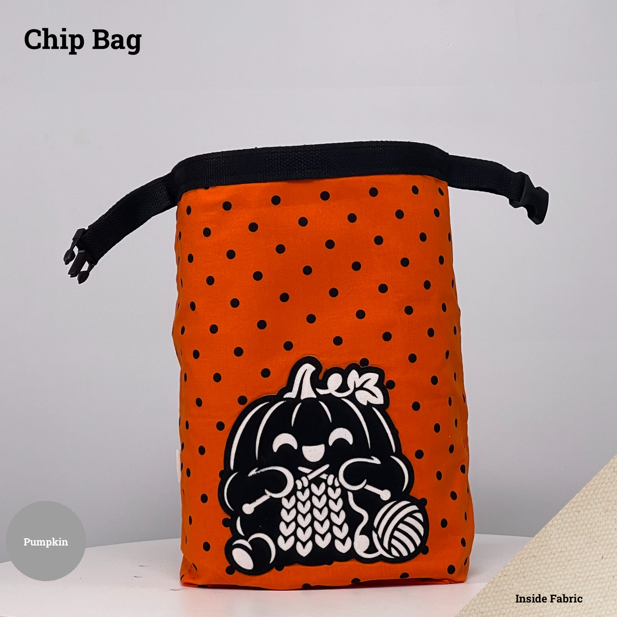 Orange-and-black polka dot Chip Bag featuring a pumpkin appliqué knitting beside a ball of yarn.