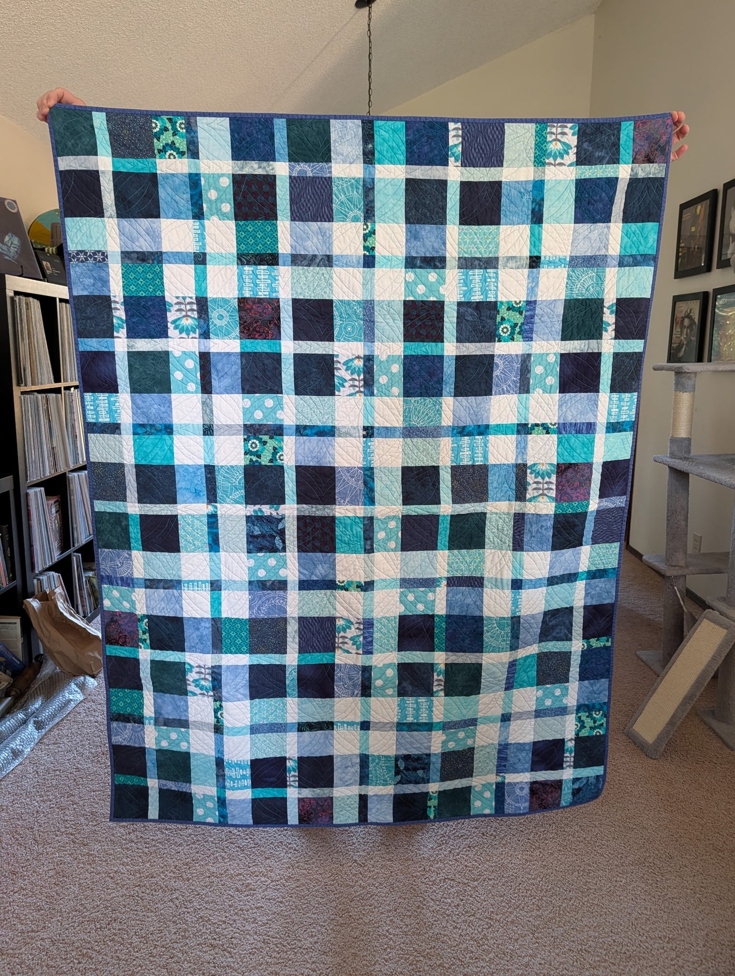 Mini Plaidish quilt front — Ocean Scrappy colorway, navy, teal, aqua and white mixed prints in a plaid layout