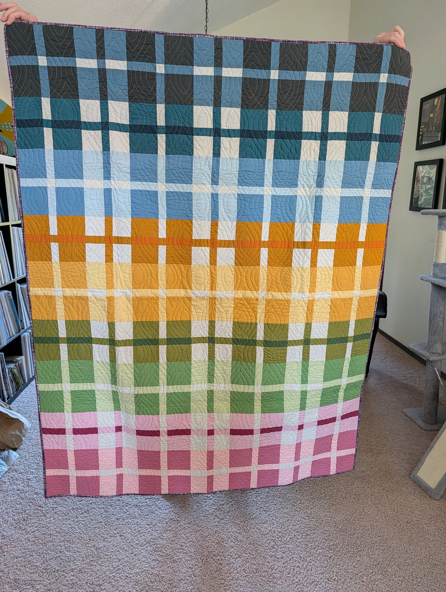 Mini Plaidish quilt front — Rainbow Gradient colorway, flowing from charcoal and teal through warm yellows and oranges to pinks and magentas